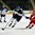 GRAND FORKS, NORTH DAKOTA - APRIL 17: Finland's Joona Koppanen #15 skates with the puck while Denmark's Rasmus Heine #7 chases him down during preliminary round action at the 2016 IIHF Ice Hockey U18 World Championship. (Photo by Minas Panagiotakis/HHOF-IIHF Images)

